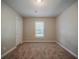 Neutral bedroom offers natural light from the window, creating a calm and inviting space at 228 Amour Sw Way, Lilburn, GA 30047