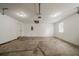 Bright two-car garage with an electrical panel, window, and door to the exterior at 228 Amour Sw Way, Lilburn, GA 30047