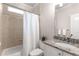 Full bathroom with a shower, a toilet, granite counter top and tile floors at 2871 Parkridge Ne, Brookhaven, GA 30319