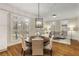 Bright breakfast area with hardwood floors, large windows, and adjacent sitting room at 2871 Parkridge Ne, Brookhaven, GA 30319
