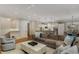 Spacious living room with a large sofa, stylish decor, and open to the kitchen at 2871 Parkridge Ne, Brookhaven, GA 30319