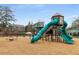 Community playground featuring slides, climbing structures, and swings for Gathering fun at 2871 Parkridge Ne, Brookhaven, GA 30319
