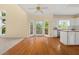 Cozy breakfast nook with hardwood floors, lots of windows, and adjacent kitchen area at 3270 Golfe Links Dr, Snellville, GA 30039