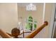 Grand foyer with a stunning chandelier and large windows offering lots of natural light at 3270 Golfe Links Dr, Snellville, GA 30039
