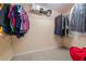 Organized walk-in closet featuring lots of shelving for clothes and accessories at 3270 Golfe Links Dr, Snellville, GA 30039