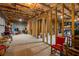 Unfinished basement offering ample storage space with exposed ceiling and framing at 4876 Briarcliff Dr, Sugar Hill, GA 30518