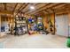 Unfinished basement offering ample storage space with exposed ceiling and framing at 4876 Briarcliff Dr, Sugar Hill, GA 30518