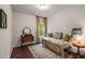 Guest bedroom featuring neutral tones, comfortable bedding, and plenty of natural light at 4876 Briarcliff Dr, Sugar Hill, GA 30518