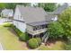 Backyard featuring lush landscaping, upper deck, and inviting outdoor space at 1021 Bluffhaven Ne Way, Atlanta, GA 30319