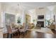 Inviting dining and living area with hardwood floors and a fireplace at 1021 Bluffhaven Ne Way, Atlanta, GA 30319