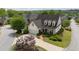 Charming home with a manicured lawn, mature trees, and a two-car garage, creating inviting curb appeal at 1021 Bluffhaven Ne Way, Atlanta, GA 30319
