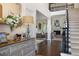 Elegant foyer with hardwood floors, a staircase with dark railings, and views into the inviting living room at 1021 Bluffhaven Ne Way, Atlanta, GA 30319