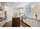 Bright kitchen with white cabinets, stainless steel appliances, and a rustic island for added charm at 1021 Bluffhaven Ne Way, Atlanta, GA 30319