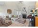 Cozy living room with a fireplace, comfortable seating, and stylish decor, perfect for relaxation at 1021 Bluffhaven Ne Way, Atlanta, GA 30319