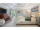 Spacious main bedroom with tray ceilings, bright windows, and luxury furnishings at 1021 Bluffhaven Ne Way, Atlanta, GA 30319