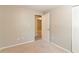 Empty bedroom with neutral carpet and freshly painted walls at 1051 S Millard Way, Stone Mountain, GA 30088