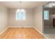 Inviting dining room with wood floors and ample natural light at 1051 S Millard Way, Stone Mountain, GA 30088