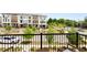 Lovely outdoor balcony view of new townhome construction, trees, and landscaping at 300 Olmstead Way, Alpharetta, GA 30022