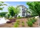 Serene townhome community with lush landscaping, sidewalks, and peaceful surroundings at 300 Olmstead Way, Alpharetta, GA 30022