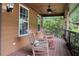 Cozy covered porch with comfortable rocking chairs, ideal for relaxing and enjoying the peaceful surroundings at 68 Edwin Pl Nw, Atlanta, GA 30318
