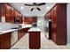 Spacious gourmet kitchen with cherry cabinets, stainless steel appliances, and a center island at 68 Edwin Pl Nw, Atlanta, GA 30318