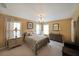 Bedroom with a neutral color scheme, windows and a chandelier at 718 Province Se Pl, Atlanta, GA 30312