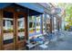 Carroll Street Cafe exterior view with dining tables, an awning, and hanging signage at 718 Province Se Pl, Atlanta, GA 30312