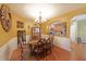 Elegant dining room with stylish furnishings, hardwood floors, and natural light at 718 Province Se Pl, Atlanta, GA 30312