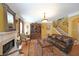 Comfortable living room showcasing a fireplace, hardwood floors, and an open staircase at 718 Province Se Pl, Atlanta, GA 30312