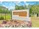 Campground Crossing community sign surrounded by colorful flower beds and landscaping at 192 Weldon Rd, Mcdonough, GA 30253