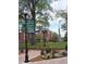 Picturesque street lamp highlighting directions in a historic town square with classic buildings in background at 192 Weldon Rd, Mcdonough, GA 30253