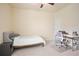 Bedroom featuring a bed, desk, and chair, perfect for work or relaxation at 3322 Grace Farm Ln, Buford, GA 30519
