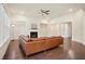 Open living room with hardwood floors, fireplace, and lots of space at 3322 Grace Farm Ln, Buford, GA 30519