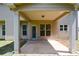 Covered patio area perfect for entertaining, or relaxing outdoors at 6816 Diamond Dr, Rex, GA 30273