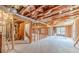 An unfinished basement featuring exposed framing and utilities, ready for customization to create additional living space at 1032 Jordan Rd, Dacula, GA 30019