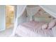 Light and airy bedroom with a view into the ensuite bathroom at 1032 Jordan Rd, Dacula, GA 30019