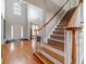 Elegant foyer with hardwood floors, staircase, and a soaring ceiling offering a grand entrance at 1032 Jordan Rd, Dacula, GA 30019