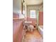 Bathroom with pink tile, outdated sink, tub and fixtures in need of updating at 118 Ingleside Dr, Jonesboro, GA 30236