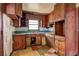 Image shows a kitchen featuring wooden cabinetry and natural light at 118 Ingleside Dr, Jonesboro, GA 30236