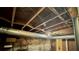 Unfinished basement with exposed ceiling at 1655 Tryon Rd, Atlanta, GA 30319