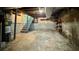 Large unfinished basement with exposed beams and concrete floor at 1655 Tryon Rd, Atlanta, GA 30319
