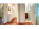 Dual bathroom view featuring vanities, stand-up shower, and classic fixtures at 1655 Tryon Rd, Atlanta, GA 30319