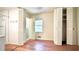 Bathroom with hardwood floors, a sink with a mirror, and a stand-up shower at 1655 Tryon Rd, Atlanta, GA 30319