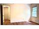 Bedroom with wood floor and light walls at 1655 Tryon Rd, Atlanta, GA 30319