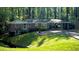Charming brick ranch home with attached carport and well-maintained front yard at 1655 Tryon Rd, Atlanta, GA 30319