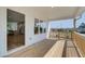 View of the spacious outdoor deck featuring wooden flooring and white railing, perfect for outdoor living at 1899 Deco Dr, Kennesaw, GA 30144