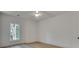 Neutral bedroom featuring a window with a view to nature and hardwood floors at 625 Home Se Ave, Atlanta, GA 30312