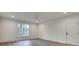 Large bedroom features stylish flooring, recessed lighting, and a window overlooking the landscape at 625 Home Se Ave, Atlanta, GA 30312