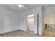 Spacious bedroom with an open closet and access to a staircase, showcasing its layout at 625 Home Se Ave, Atlanta, GA 30312