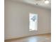 Bright bedroom with a neutral color scheme, hardwood floors, and ample natural light from a window at 625 Home Se Ave, Atlanta, GA 30312